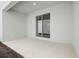 Covered patio with concrete flooring and a sliding glass door at 520 Orient Ave, Debary, FL 32713