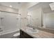 Bathroom with shower and single vanity at 5427 Dragonfly Dr, Wildwood, FL 34785
