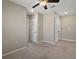 Spacious bedroom with neutral walls and ceiling fan at 5427 Dragonfly Dr, Wildwood, FL 34785
