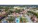 Apartment building, pool, and tennis court view at 5600 Devonbriar Way # 204, Orlando, FL 32822