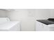 Bright laundry room, featuring a washer and dryer at 5600 Devonbriar Way # 204, Orlando, FL 32822