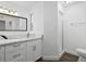 Modern bathroom with white cabinets, quartz countertop, and walk-in shower at 670 Sandy Neck Ln # 103, Altamonte Springs, FL 32714