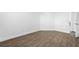 Bright bedroom with wood-look floors at 670 Sandy Neck Ln # 103, Altamonte Springs, FL 32714