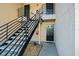 Condo building entrance with stairs leading to multiple units at 670 Sandy Neck Ln # 103, Altamonte Springs, FL 32714