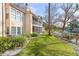 Building exterior showcasing landscaping and a tranquil setting at 670 Sandy Neck Ln # 103, Altamonte Springs, FL 32714