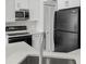 Modern kitchen with stainless steel appliances at 670 Sandy Neck Ln # 103, Altamonte Springs, FL 32714
