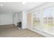 Living room with fireplace, wood-look floors and patio access at 670 Sandy Neck Ln # 103, Altamonte Springs, FL 32714