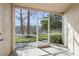 Private screened patio with access to green space at 670 Sandy Neck Ln # 103, Altamonte Springs, FL 32714