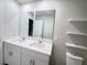 Double sink bathroom vanity with shelving at 849 Rivers Crossing St, Clermont, FL 34714
