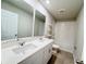 Bathroom boasts double vanity and bathtub at 849 Rivers Crossing St, Clermont, FL 34714