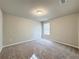 Bright bedroom featuring carpet and window at 849 Rivers Crossing St, Clermont, FL 34714