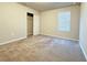 Bright bedroom with neutral walls, carpet, and a large closet at 849 Rivers Crossing St, Clermont, FL 34714