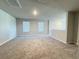 Large bonus room with neutral walls and carpet flooring at 849 Rivers Crossing St, Clermont, FL 34714