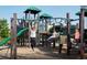 Children playing on a modern playground at 849 Rivers Crossing St, Clermont, FL 34714