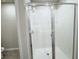 Large walk-in shower with glass enclosure at 849 Rivers Crossing St, Clermont, FL 34714