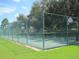 Outdoor basketball court with green fencing and well-maintained surface for recreational activities at 11618 Grand Bay Blvd, Clermont, FL 34711