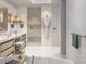 Spa-like bathroom featuring dual vanities, a walk-in shower, and luxurious finishes at 10601 Autumn Mist Ln # 302, Golden Oak, FL 32836