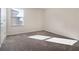Bright bedroom featuring neutral walls and plush carpeting at 1016 Downswing Pl, Davenport, FL 33896