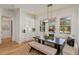 Breakfast nook with built-in bench seating, custom cabinets, and a view of the backyard at 10416 Pocket Ln, Orlando, FL 32836