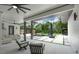 Open-air patio overlooking pool features sleek tiles and minimalist lounge seating at 10416 Pocket Ln, Orlando, FL 32836
