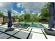 Beautiful pool and backyard with chic patio design and manicured landscape at 10416 Pocket Ln, Orlando, FL 32836