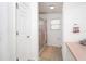 Bathroom with shower, toilet and double sink vanity at 1207 Palmetto Dr, Lady Lake, FL 32159