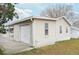 This home features a garage at 1207 Palmetto Dr, Lady Lake, FL 32159
