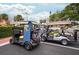 Two Yamaha golf carts parked, ready for a round of golf at 1207 Palmetto Dr, Lady Lake, FL 32159