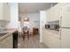 Kitchen with a breakfast nook and light wood flooring at 1207 Palmetto Dr, Lady Lake, FL 32159