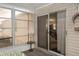 Relaxing screened porch with sliding glass door access at 1207 Palmetto Dr, Lady Lake, FL 32159