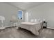 Cozy bedroom with a full-size bed and a writing desk at 1231 Citrus Landings Blvd, Davenport, FL 33837
