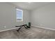 Spacious bedroom with a weight bench and plenty of room for fitness at 1231 Citrus Landings Blvd, Davenport, FL 33837