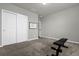 Versatile bedroom with a weight bench and ample space for various uses at 1231 Citrus Landings Blvd, Davenport, FL 33837