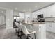 Island kitchen with granite countertops and stainless steel appliances at 1231 Citrus Landings Blvd, Davenport, FL 33837