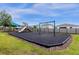 playground with swings and slides in a safe, fenced area at 1231 Citrus Landings Blvd, Davenport, FL 33837