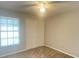 Spacious bedroom with neutral walls and carpet flooring at 12703 Whiterapids Dr, Orlando, FL 32828