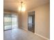 Dining room with tile flooring and access to living room at 12703 Whiterapids Dr, Orlando, FL 32828