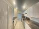 Clean and bright kitchen with white cabinets and granite countertops at 12703 Whiterapids Dr, Orlando, FL 32828