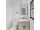 Modern bathroom with gray vanity and a rectangular mirror at 137 Scott Dr, Sanford, FL 32771