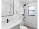 Modern bathroom with marble shower and gray vanity at 137 Scott Dr, Sanford, FL 32771