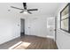 Main bedroom with ensuite bathroom and hardwood floors at 137 Scott Dr, Sanford, FL 32771