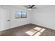 Spacious bedroom with hardwood floors and a ceiling fan at 137 Scott Dr, Sanford, FL 32771