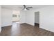Bright bedroom with hardwood floors and ceiling fan at 137 Scott Dr, Sanford, FL 32771