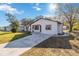 Newly renovated house with a stone facade and a well-manicured lawn at 137 Scott Dr, Sanford, FL 32771