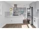 Modern kitchen featuring gray cabinets and stainless steel appliances at 137 Scott Dr, Sanford, FL 32771