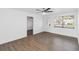 Bright living room featuring hardwood floors and a ceiling fan at 137 Scott Dr, Sanford, FL 32771