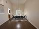 Dining area with a white table and six chairs at 14416 Verano Dr, Orlando, FL 32837