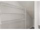 White wire shelving pantry offers ample storage space at 1527 Isleta Loop, Kissimmee, FL 34741