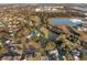 Aerial view of expansive lot with private pond and mature trees at 1730 Connecticut Ave, St Cloud, FL 34769