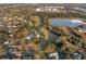 Aerial view of expansive lot with private pond and mature trees at 1730 Connecticut Ave, St Cloud, FL 34769
